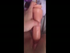 A scat adolescent uses a hard pink dildo to demolish her pussy